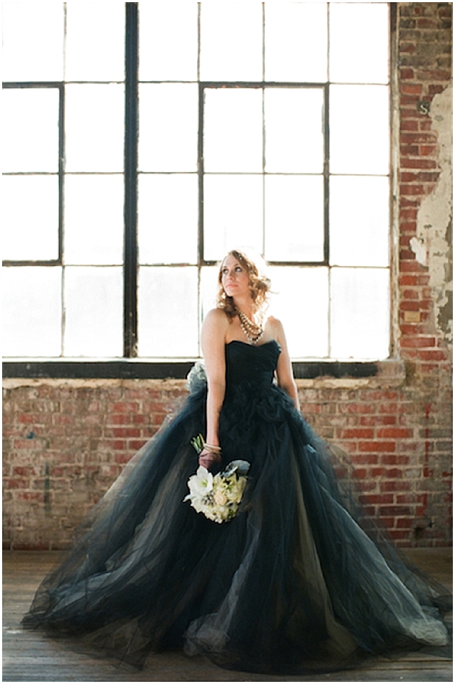 A small and intimate loft wedding with pretty black accents