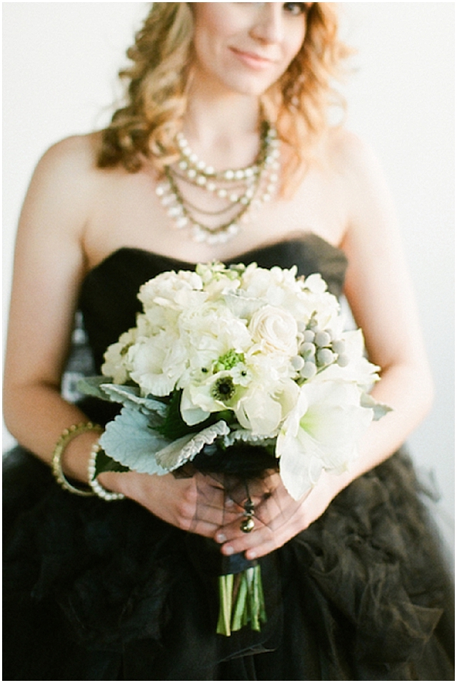 A small and intimate loft wedding with pretty black accents