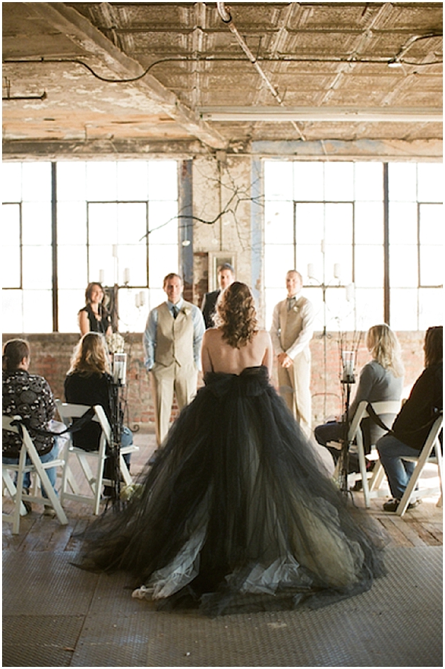 A small and intimate loft wedding with pretty black accents