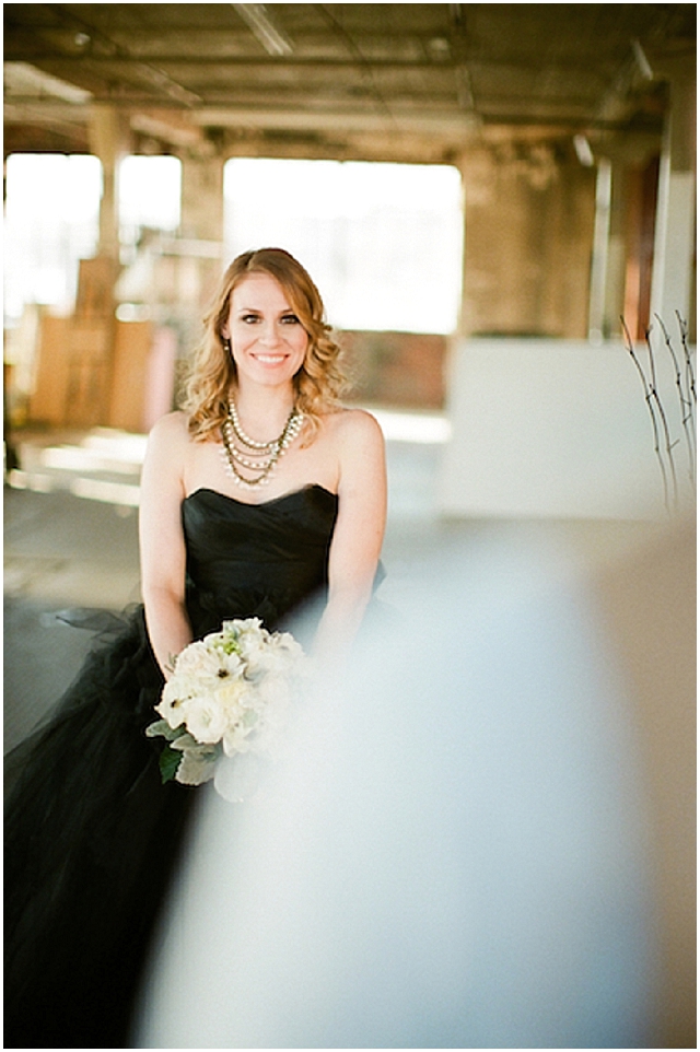 A small and intimate loft wedding with pretty black accents