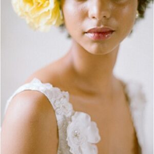 beautiful bride with yellow flower in hair