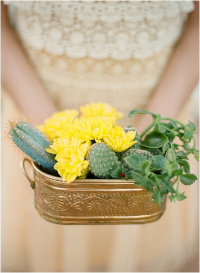 yellow flowers and cactus centrepiece