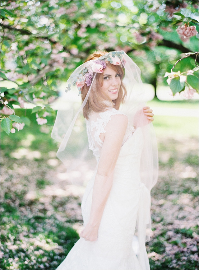 beautiful bride with flower crown and veil