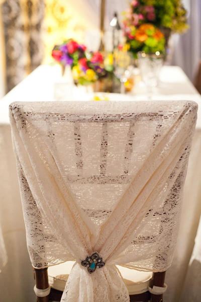 Lace and brooch chair cover