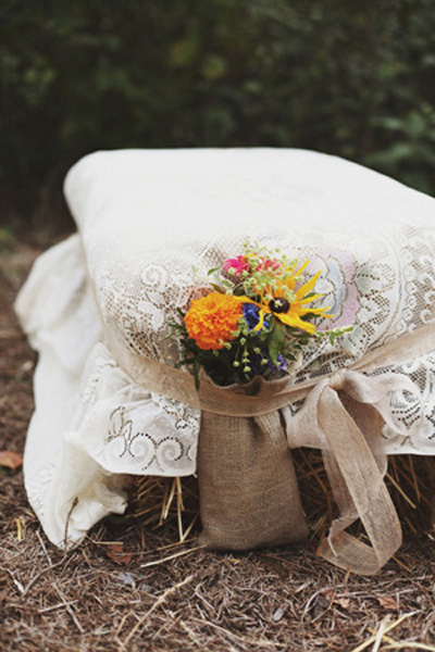 hay stack and lace for wedding ceremony
