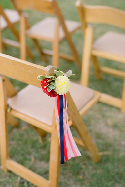 wooden chair with flowers and ribbons