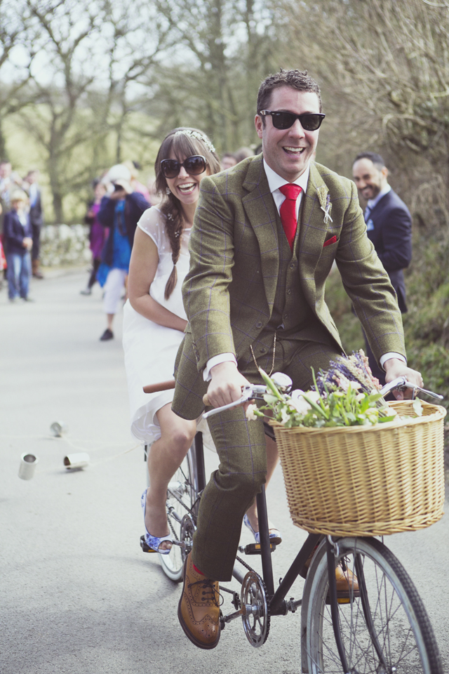 Bride and groom on 70s vintage tandem