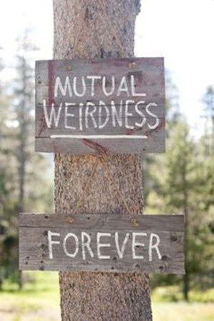 mutual weirdness wedding signage