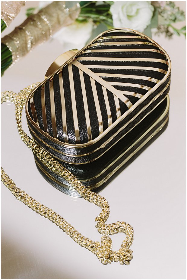 black and gold art deco inspired bridal clutch