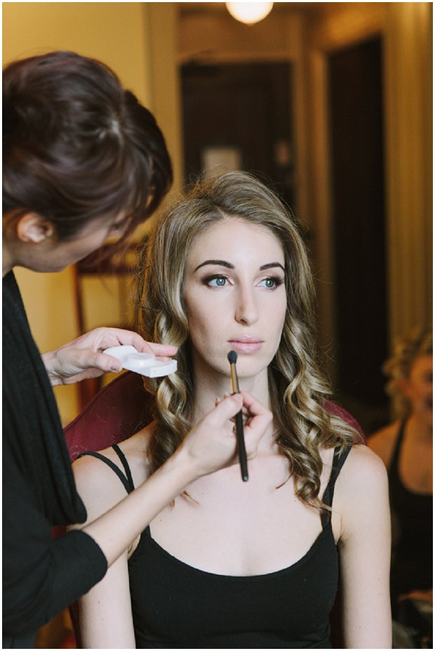 bride getting her makeup applied