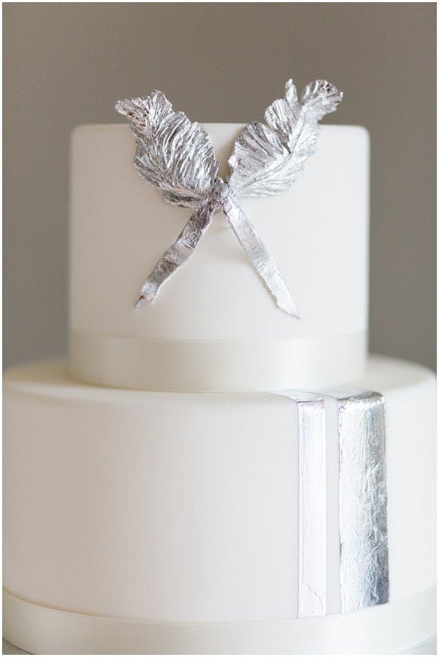 modern wedding cake with metallic silver