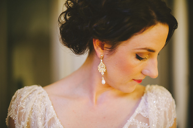 Antique style wedding dress with lace and chandelier earings