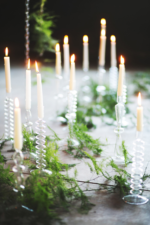 fern foliage and glass candelabra wedding centerpieces