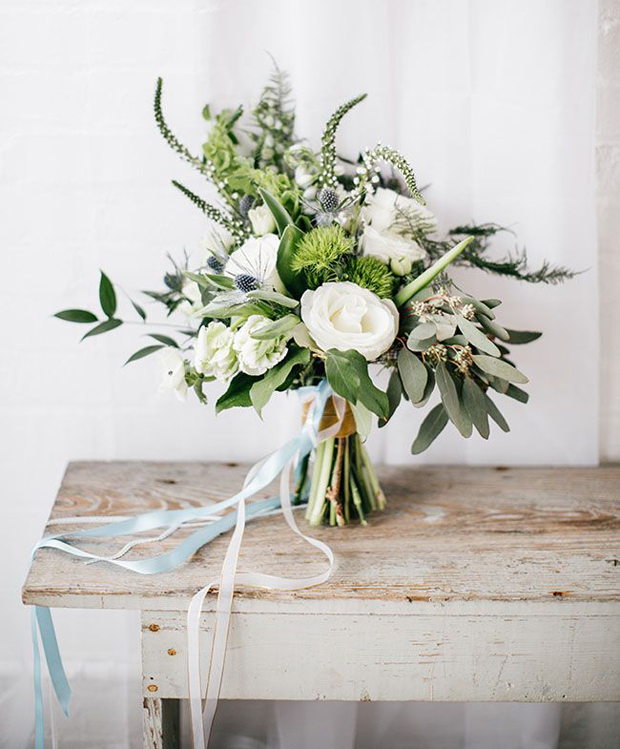 organic wedding bouquet with sky blue ribbons