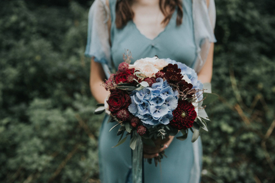 A Winter Themed Alice in Wonderland Bridal Shoot With Pale Blue & Deep Red