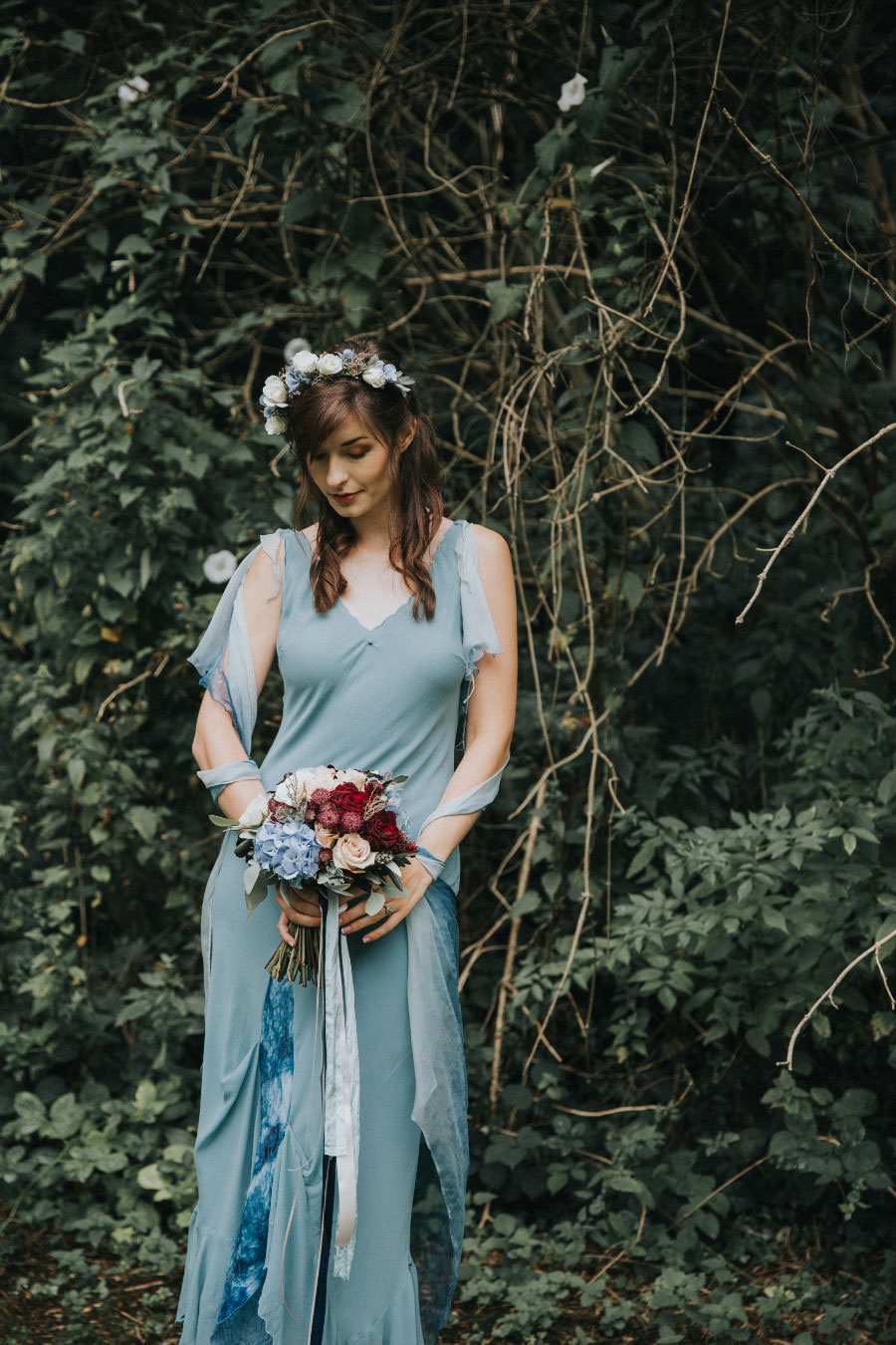 A Winter Themed Alice in Wonderland Bridal Shoot With Pale Blue & Deep Red