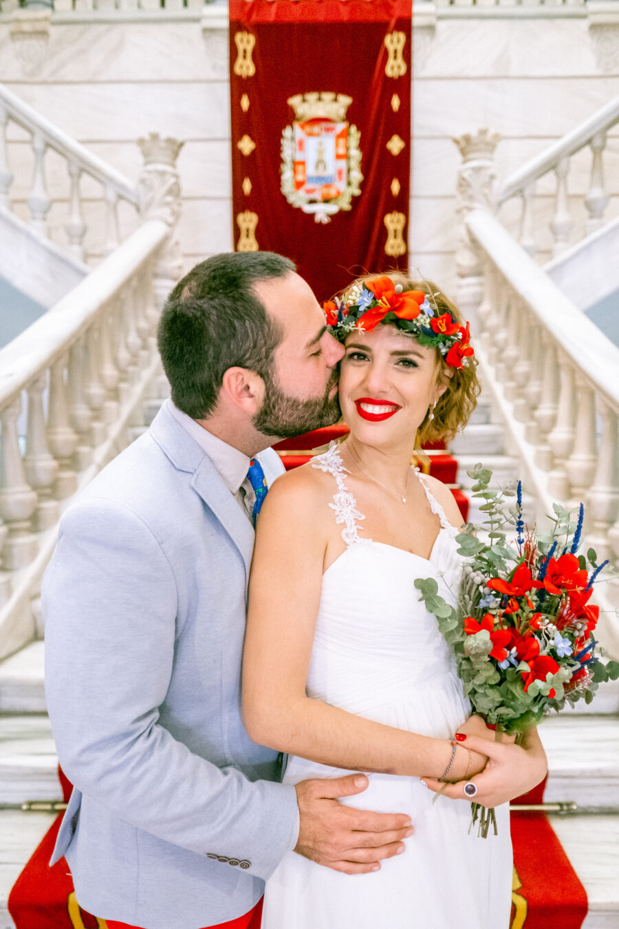 Spanish Red Wedding with Blue & Red Floral Crown: Kleio & Julio