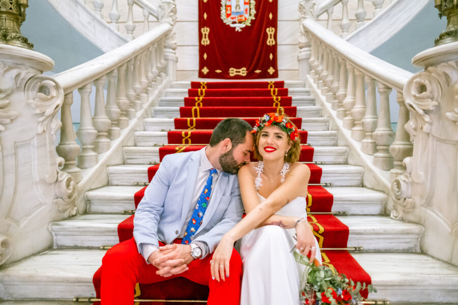 Spanish Red Wedding with Blue & Red Floral Crown: Kleio & Julio