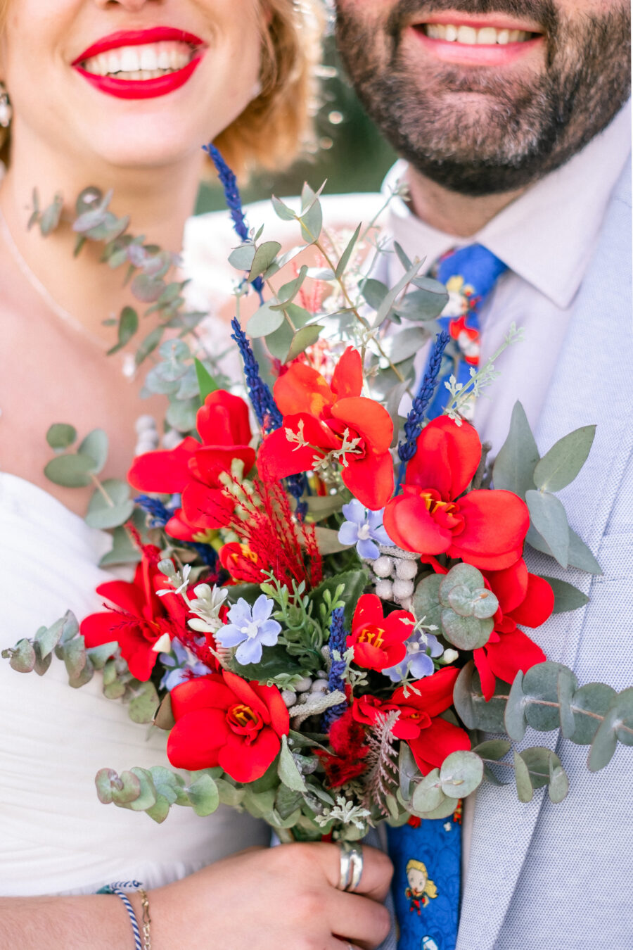 Spanish Red Wedding with Blue & Red Floral Crown: Kleio & Julio