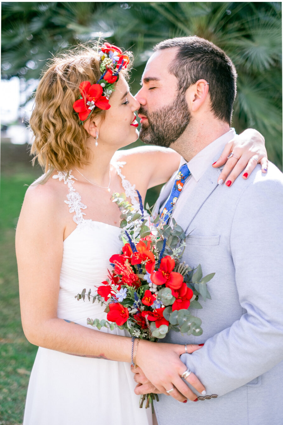 Spanish Red Wedding with Blue & Red Floral Crown: Kleio & Julio