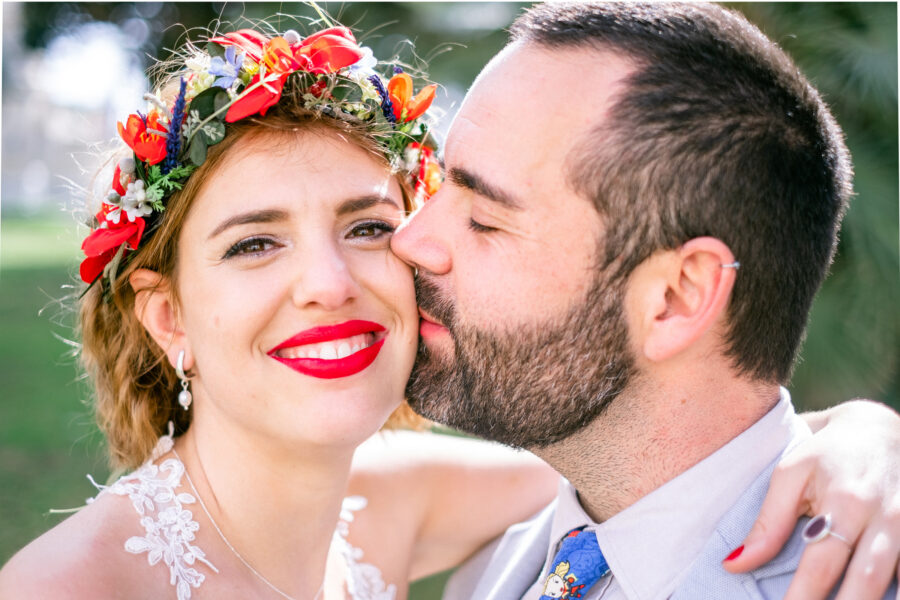 Spanish Red Wedding with Blue & Red Floral Crown: Kleio & Julio